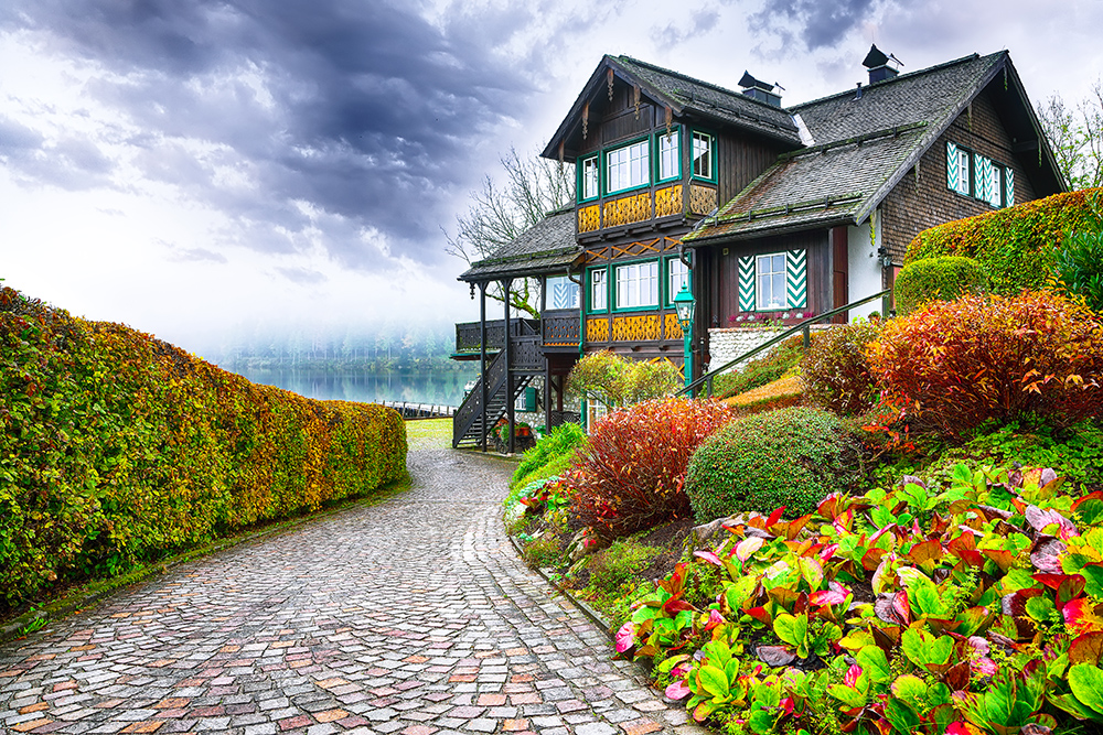 Misty morning on Altaussee village.Misty autumn scene in the morning. Location: resort village Altaussee, Liezen District of Styria, Austria, Alps. Europe.